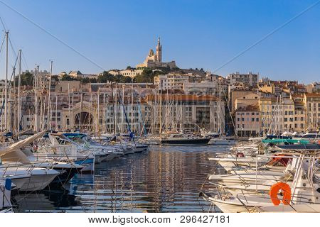 Old Port and Basilica of Notre Dame - Marseille France - travel and architecture background