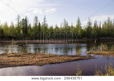 North River Flowing Across Green Forest. Spring. Before The Rain