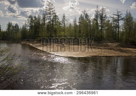North River Flowing Across Green Forest. Spring. Before The Rain