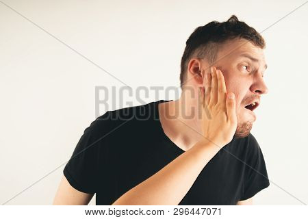Crop Person Slapping Scared Man In Face
Emotional Male Getting Slapped In Face While Shouting With C