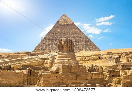 Front View Of Sphinx And Khafre Pyramid In The Desert Of Giza, Egypt