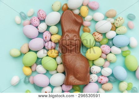 Happy Easter Concept. Preparation For Holiday. Easter Candy Chocolate Eggs Bunny And Jellybean Sweet