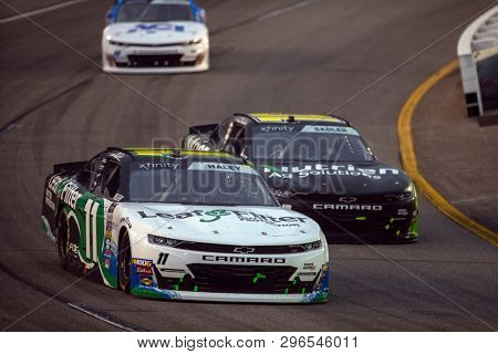 April 12, 2019 - Richmond, Virginia, USA: Justin Haley (11) battles for position for the ToyotaCare 250 at Richmond Raceway in Richmond, Virginia.