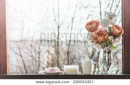 Cozy Spring Still Life: Cup Of Hot Tea With Spring Bouquet Of Flowers On Vintage Windowsill With A P