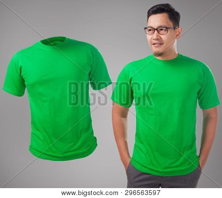 Green T-shirt Mock Up, Front View, Isolated. Male Model Wear Plain Green Shirt Mockup. Tshirt Design