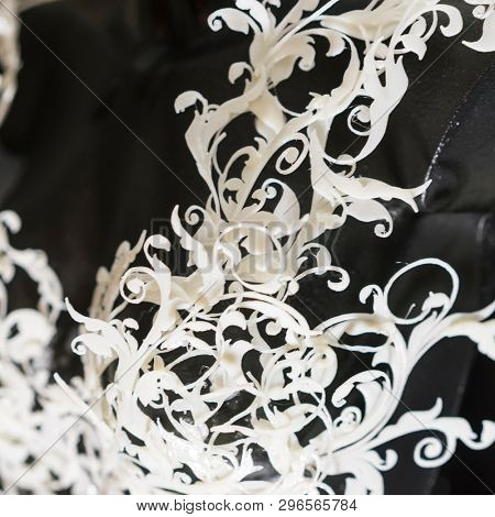 Piece made with 3d printer, is composed of white flowers that form a corset, handmade, fantasy design Baroque style
