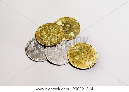 Crypto Currency Golden And White Bitcoin Isolated On White Background.