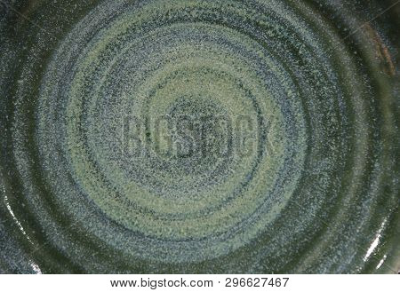 Background Of Old Pottery With Molds Of Mint