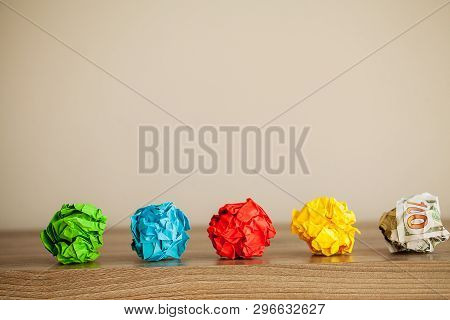 Great Idea Concept. Crumpled Colorful Paper On Wooden Table. Copy Space