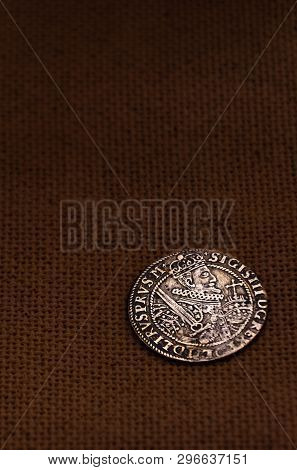 Old Silver Coin On Linen Background. Thaler.