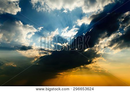 Beautiful Colorful Sunset Sky Over Tranquil Sea Surface With Dramatic Light.