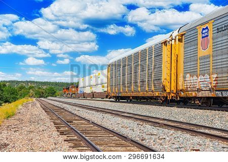 Freight Train Bnsf Railway Companies On A Sunny Day In Arizona.