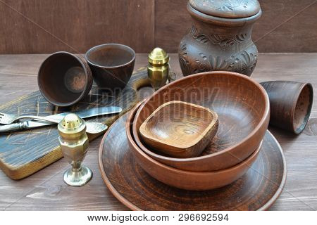 Empty Restaurant Tableware. Rustic Wooden Brown Background.