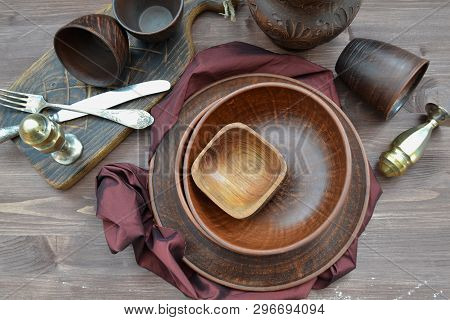 Top View Of Empty Plates. Rustic Pottery And Home Interior Decor. Antique Metal