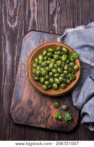 Sweet Fresh Gooseberry Berry In A Bowl On Dark Background. Top View