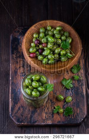 Sweet Fresh Gooseberry Berry In A Bowl On Dark Background. Top View