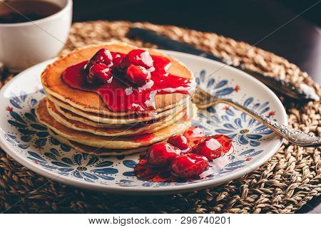 Stack Of Pancakes With Dogberry Jam On White Plate With Ornate