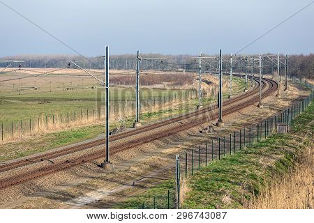 Dutch Railway Through National Park Oostvaardersplassen Between Lelystad And Almere