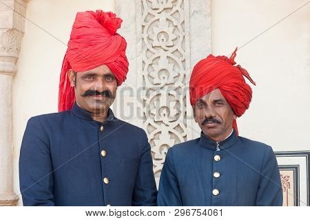 Jaipur, India - January 3, 2019: Smiling Rajasthani Men Poses For A Photo In Jaipur City Palace In R