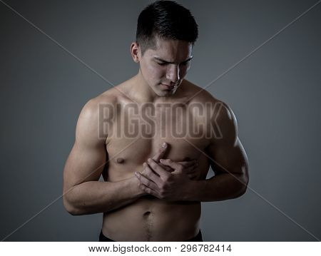 Young Fit Strong Man Suffering Intense Chest Pain Having Heart Attack