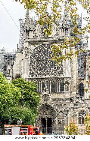 Paris, France - April 16th, 2019: Firemen Next To The Cathedral Notre Dame De Paris After The Tragic