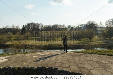 River With A Bridge In The Backround In Sabile, Latvia