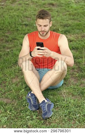 Set Up Application. Sportsman With Smartphone And Pedometer Prepare For Jog. How Set Up Route For Jo