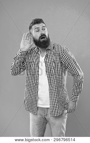 Eavesdropping And Spying. Hearing Test. Man Bearded Hipster Hold Hand Near Ear To Hear Better. Guy T