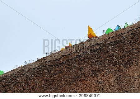 Cullet Of Broken Glass Bottles On Top Of A Garden Wall In Morocco