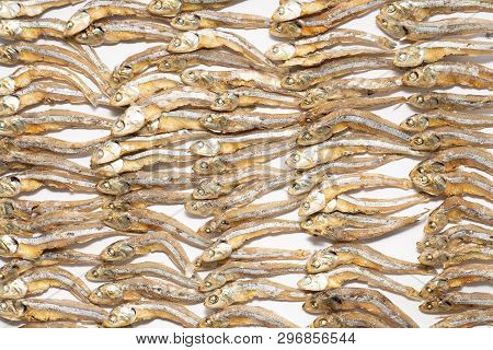 Plenty Of Small Dried Fish From Sea That Are Arranged In Group,top View Of Small Dried Fish Pattern,