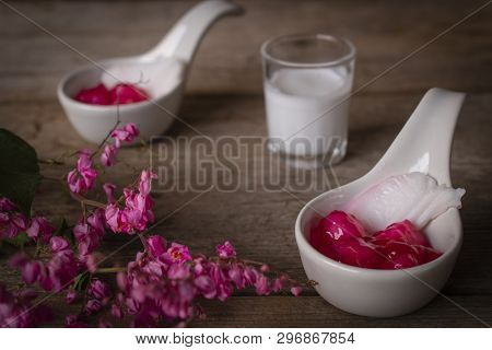 Thapthim Krop, Mock Pomegranate Seeds In Coconut And Syrup In The White Spoon Bowl On The Wood Table
