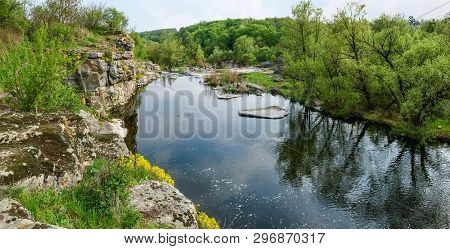 Panoramic View Of The River Section With Rocky Shore