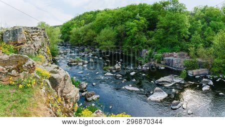 Panoramic View Of The River Section With Rocky Shore
