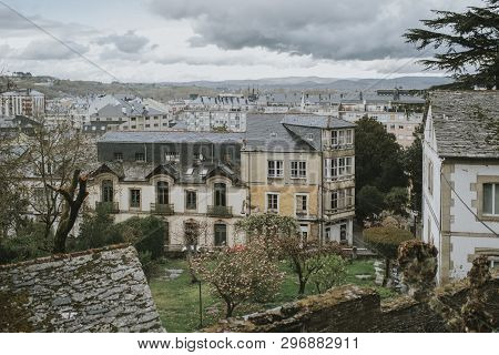 Sarria, Spain - April 6th, 2019: High Panoramic Of Sarria Village From High Point Of View In A Cloud