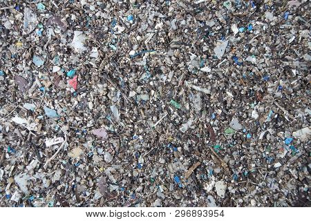Micro Plastics Marine Debris On The Sand Beach.