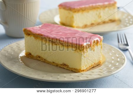 Dutch Tompouce pastry with pink icing close up
