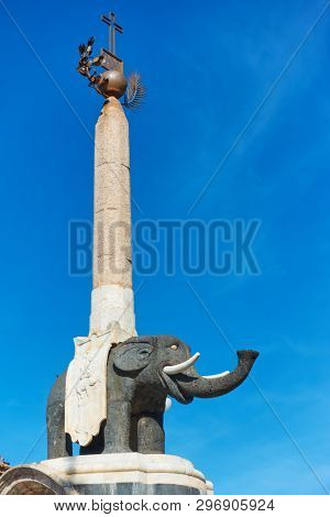 Black elpehant with obelisk on its back in Piazza del Duomo in Catania - symbol of the city of Catania, Italy. Created by the architect Giovanni Battista Vaccarini around the 1736