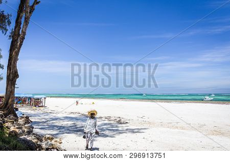 Diani Beach, Kenya - October 14, 2018: Native African Man And Diani Beach Seascape, Kenya