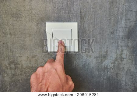 Man Hand, To Turn Off The Light, Switch, Front View.