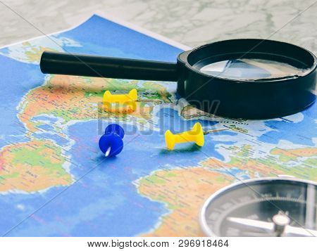 Top View Of A Map And Items. Planning A Trip Or Adventure. Travel Planning Dreams. Map Of The World.