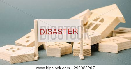 A Poster With The Inscription Disaster And Fallen Wooden Houses. Urgent Evacuation Of People. Hurric