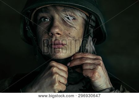 Preparing For Being Stronger Like A Stone. Close Up Portrait Of Young Female Soldier. Woman In Milit