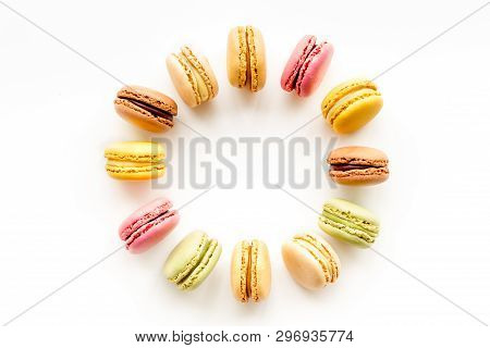 Brignt Macarons For Sweet Break On White Background Top View Frame