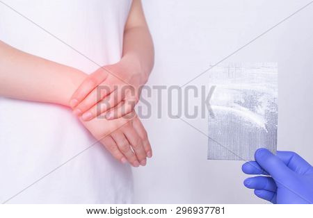 A Doctor Examines A Patient With An Ultrasound Scan That Has Pain And Inflammation In The Wrist, Pos