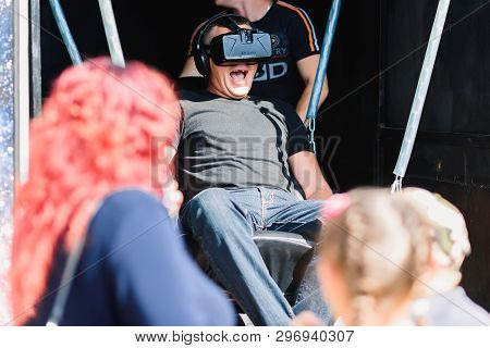 Luh, Russia - August 27, 2016: Emotional Adult Man In Virtual Reality Glasses
