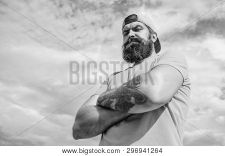 Masculinity And Brutality. Lumbersexual Tattooed Well Groomed Hipster. Hipster With Mustache And Lon