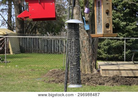 Many Different Shapes Bird Feeders Birdhouse For Nesting Box Hanging On Wooden Fence. Bird Feeders I