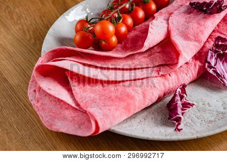 Lavash with tomatoes (soft, thin unleavened flatbread)