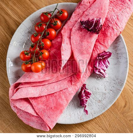 Lavash with tomatoes (soft, thin unleavened flatbread)