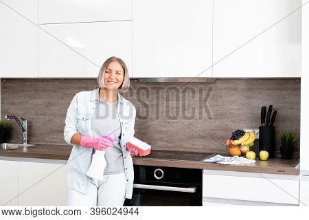 Woman Doing Cleaning Kitchen. Washing A Kitchen. House Cleaning